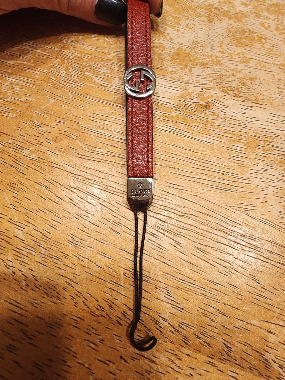 authentic vintage Gucci Interlocking G leather phone strap/charm.